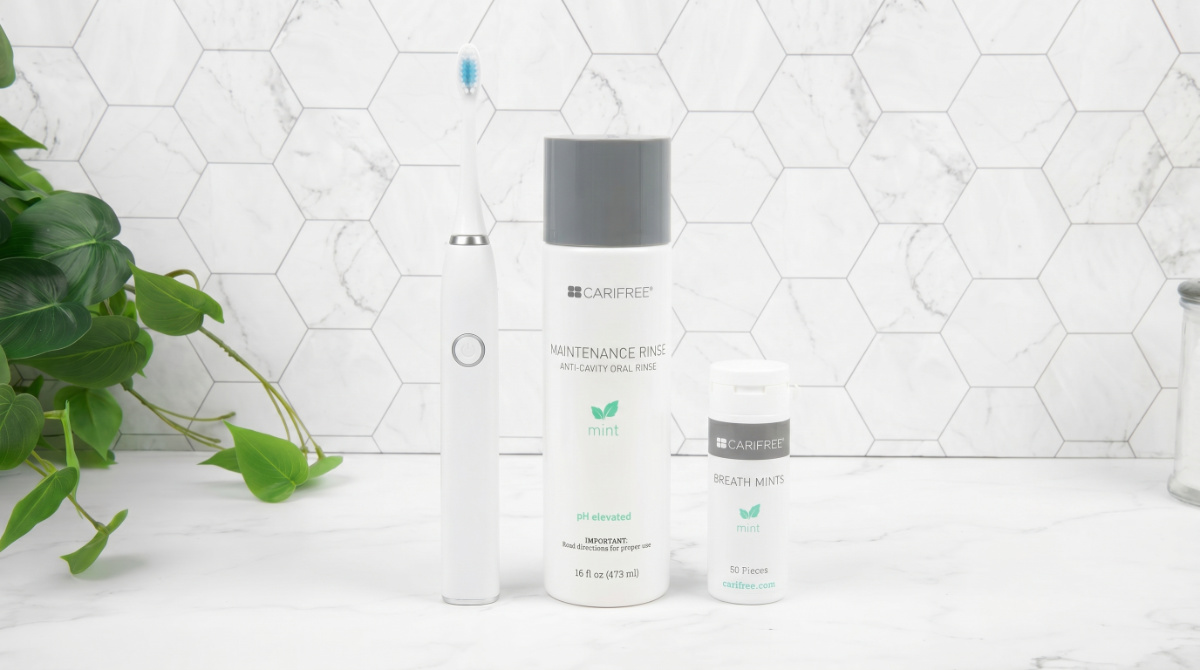 CariFree Maintenance Rinse, xylitol breath mints, and an electric toothbrush for preventing wisdom tooth bad breath.